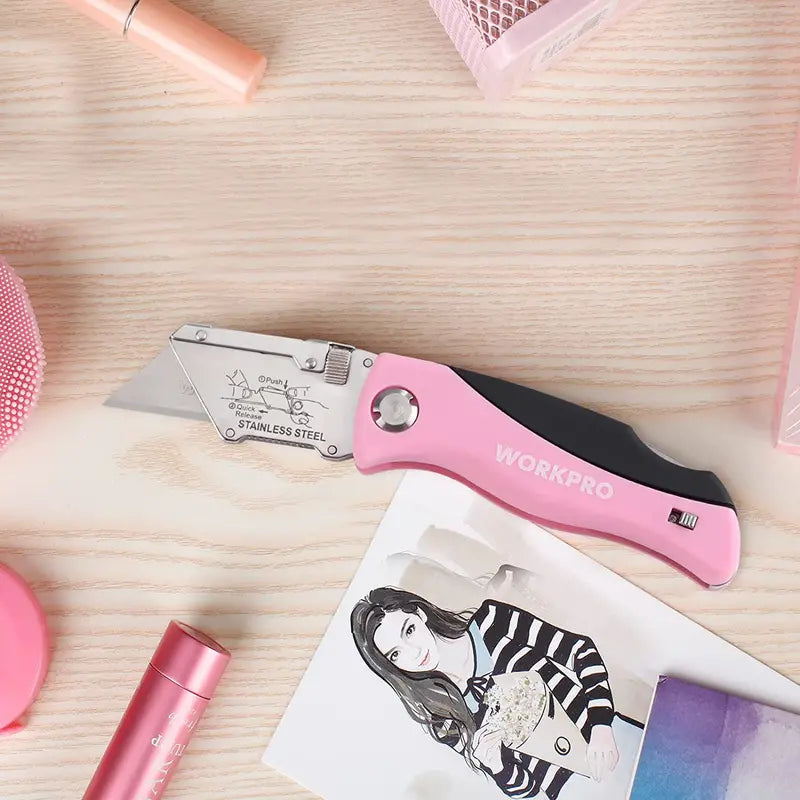 WORKPRO Pink Folding Utility Knife – Quick-Change Razor Blade Cutter with Pink Ribbon Design